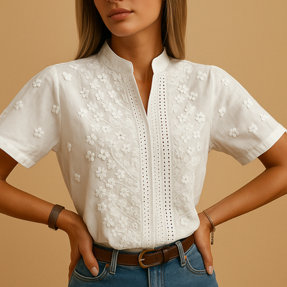 White elegant blouse for women with a classic collar and button-down design, ideal for work, casual days, or evening outings.